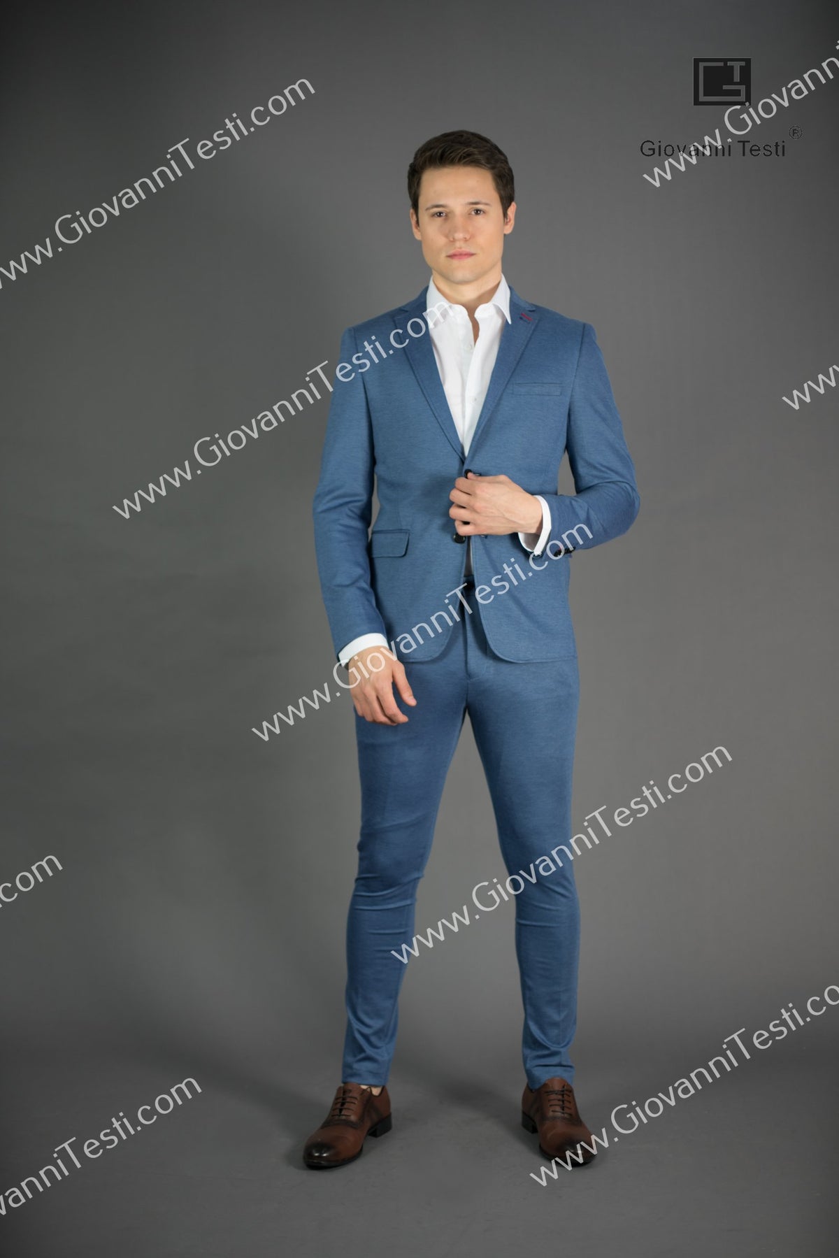 Giovanni Testi 2 button stretch Medium Blue Travel Suit GTRVL2N-01 M.BLUE